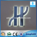 Commercial letter sign reverse lit stainless steel channel letter